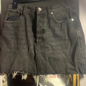 Black denim skirt with adjustable back strap!! cutest look for any occasion!!